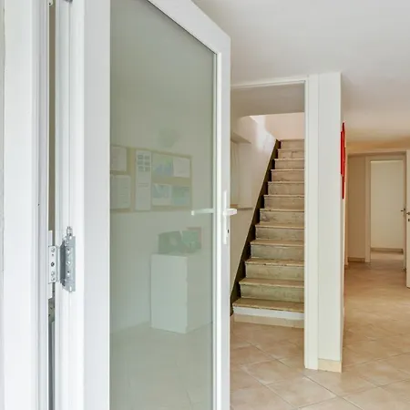 Guesthost - Migliarina Bedrooms