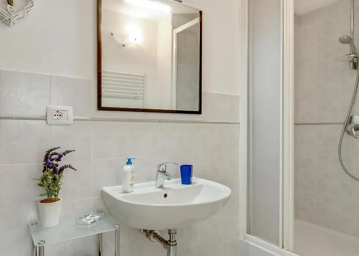 Apartmán Guesthost - Migliarina Bedrooms